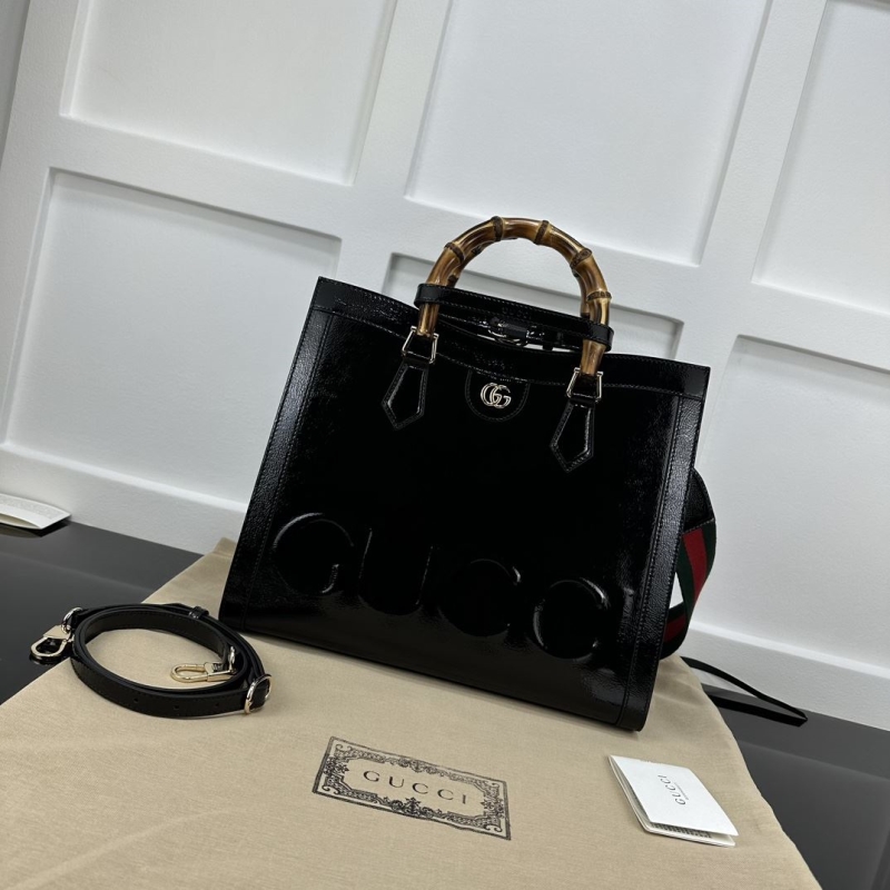 G*u*i shopping bags